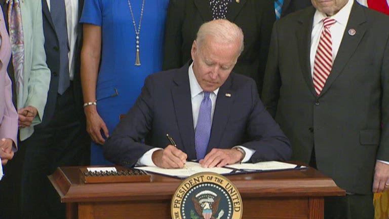 biden signs crime victims funding bill.jpg